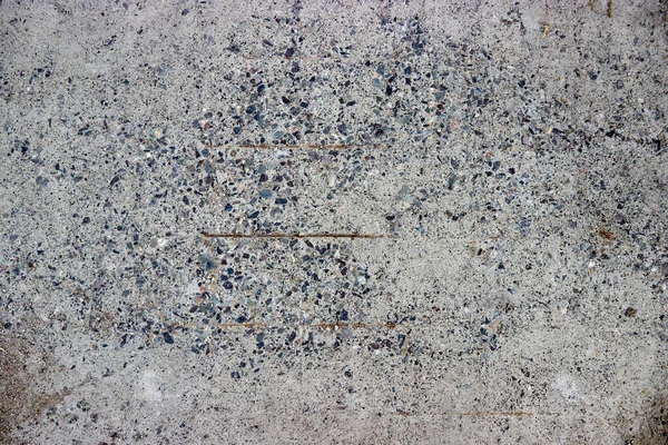 Textur aus altem Beton mit Kies und rostigen Bewehrungen — Stockfoto