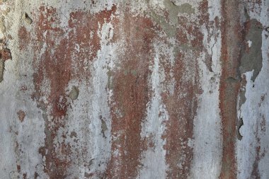 Eski duvar deseni aşınmış alçı ve beyaz boya kabuğu.