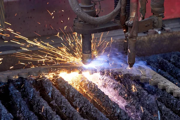 sparks of plasma cutting machine nozzles during cutting metal detail