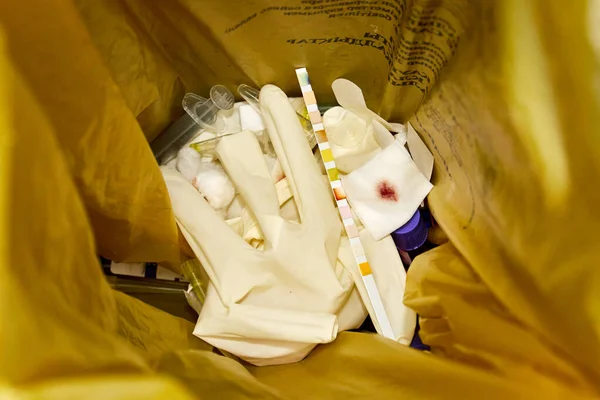 medical laboratory waste in a plastic bag for hazardous waste
