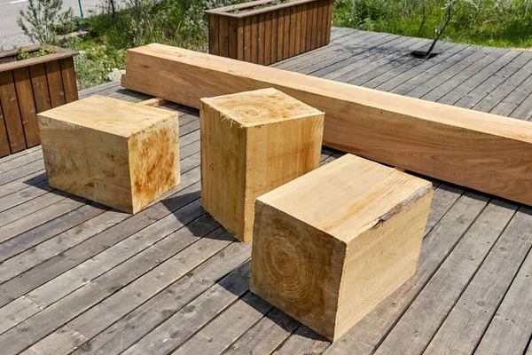 Square bars of the bench made of a single trunk of the Tien Shan spruce — Stock Photo, Image