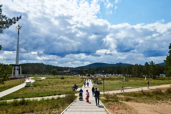 Burabay, Kazakhstan - July 27, 2021: view of the field with the monument and walking people — Stock Photo, Image