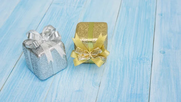 Silver Gold Gift Box Blue Wooden Table — Stock Photo, Image