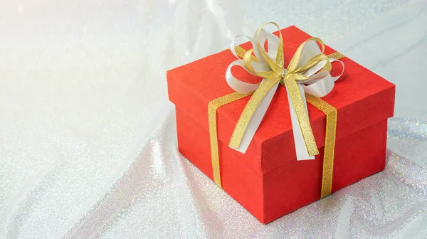 Red Gift Box Gold Ribbon White Fabric Background — Stock Photo, Image