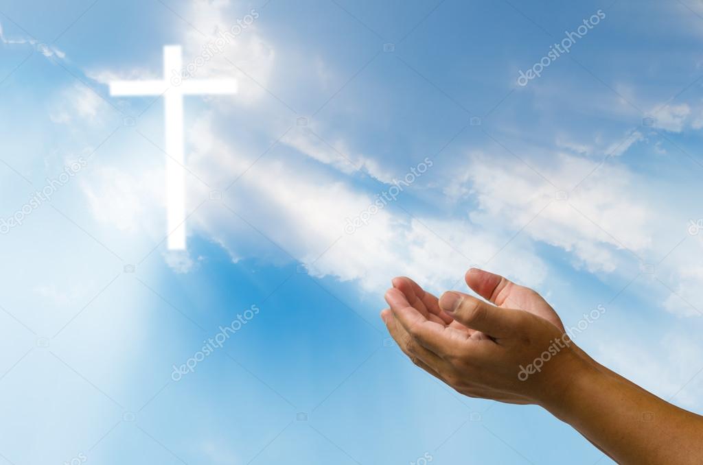 Pray for God's blessing Cross on natural background