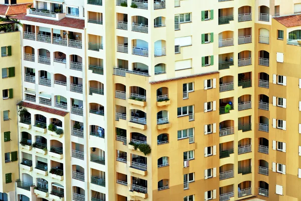 Modern city residential apartments in high rise building with balconies — Stock Photo, Image