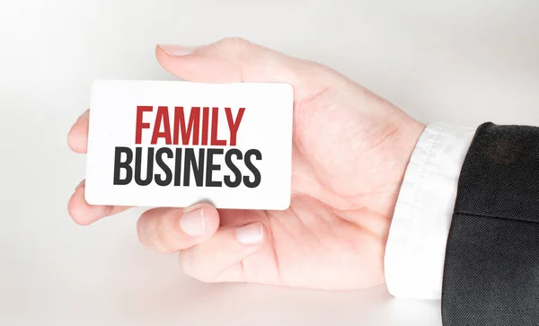 Zakenman Met Een Kaart Met Tekst Family Business — Stockfoto