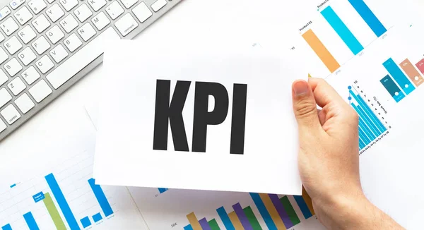 Businessman Holding Card Text Kpi Keyboard Diagram White Background — Stock Photo, Image