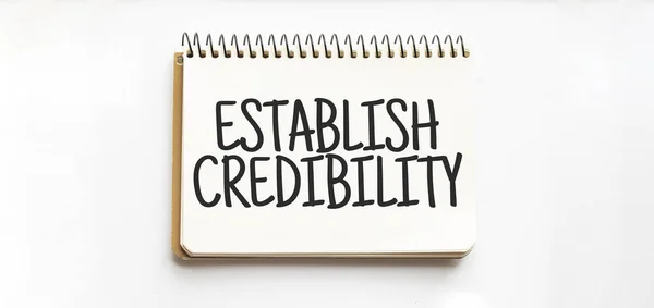 Notatnik Tekstem Establish Credibility Białe Tło Biznes — Zdjęcie stockowe