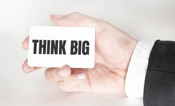 Uomo Affari Possesso Una Carta Con Testo Think Big — Foto Stock