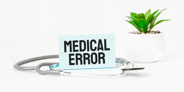 Medical Error Word Notebook Stethoscope Green Plant — стоковое фото