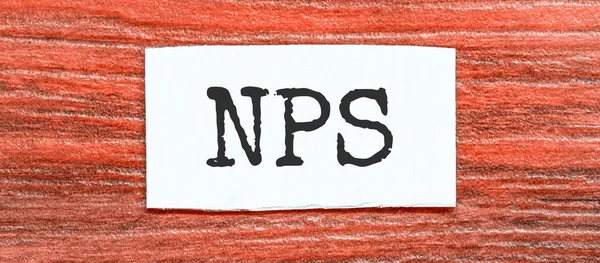 Nps Net Promoter Score Text Papperet Rött Trä Bakgrund — Stockfoto
