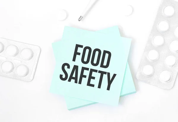 Синя Картка Текстом Food Safety Столі Таблетками Олівцем Медична Концепція — стокове фото