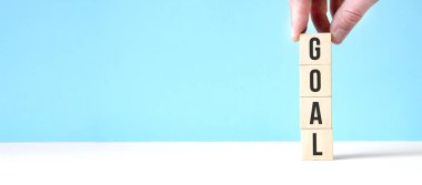 hedef yeni yıl tahta küpleri mavi masa arka planında metin için fotokopi alanı. İş Hedefleri, Görev, Kararlılık, Yeni Yıl Yeni Sen konsepti