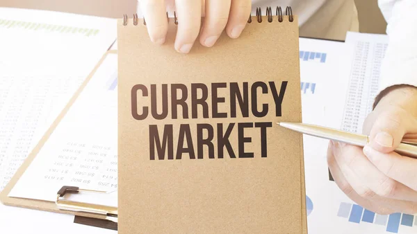 Text Currency Market Brown Paper Notepad Businessman Hands Table Diagram — Stok fotoğraf