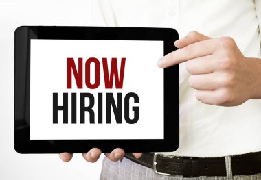 Metin şimdi beyaz fırında iş adamlarının ellerinde tablet vitrininde işe alınıyor. İş konsepti