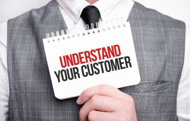 Not defteri olan bir iş adamı. KÜTÜRÜNÜĞÜNÜNÜZ