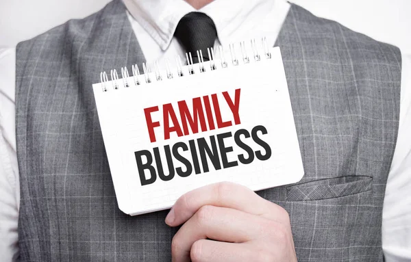 Zakenman Met Notitieboekje Met Tekst Family Business — Stockfoto