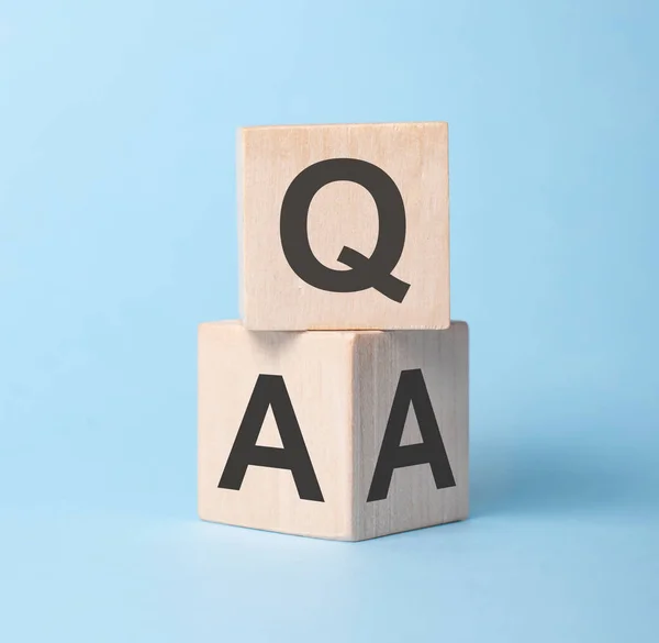 Q A, questions and answers on wooden cubes