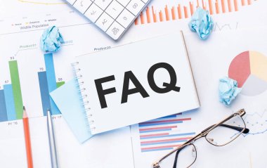 İş grafikleri, kalem ve iş konularında faq içeren not defteri