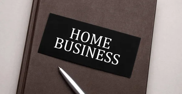Tanda Home Business Tertulis Pada Stiker Hitam Notepad Coklat Konsep — Stok Foto