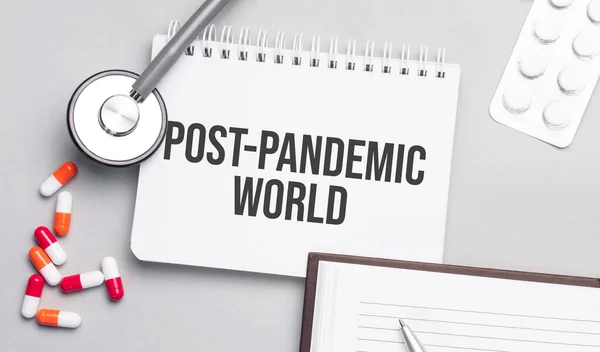 Stethoscope Pills Notebook Post Pandemic World Text Medical Table — ストック写真