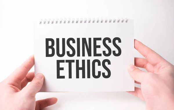 Business Ethics Slovo Nápis Bílém Papíře List Rukou Muže Černá — Stock fotografie