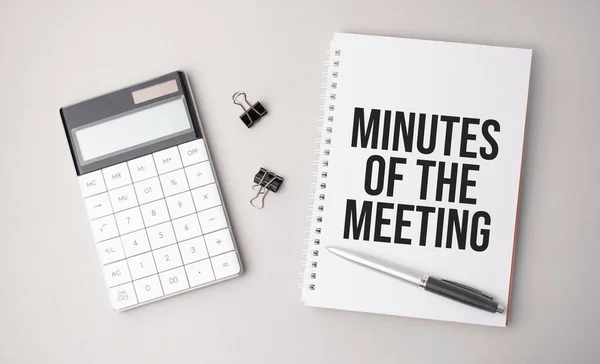 Word Minutes Meeting Written White Background Next Pen Calculator Reports — Stock Photo, Image