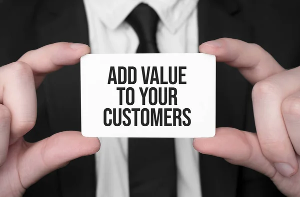Empresário Segurando Cartão Com Texto Adicionar Valor Para Seus Clientes — Fotografia de Stock