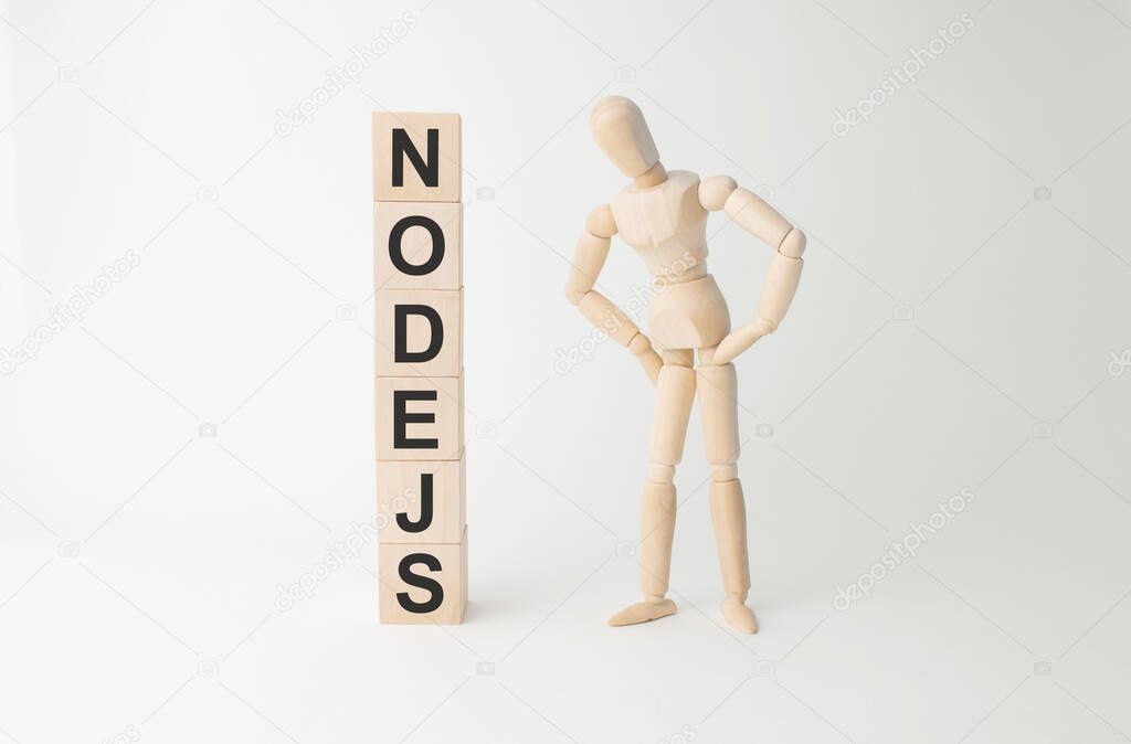 Wooden mannequin near tower of cubes with word INCOME on table against light background