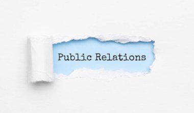 Yırtık sarı kağıdın arkasında Halkla İlişkiler görünüyor