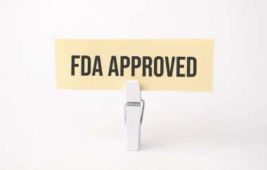 FDA kağıt üzerinde metni onayladı. Beyaz arkaplanda