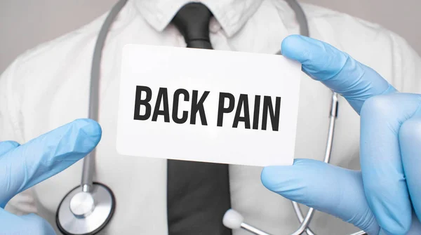 Doctor Holding Card Back Pain Medical Concept — Stock Photo, Image