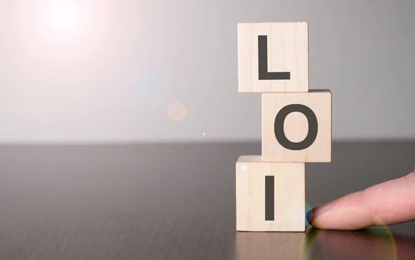 Businesswoman Made Word Loi Wood Building Blocks — Stock Photo, Image