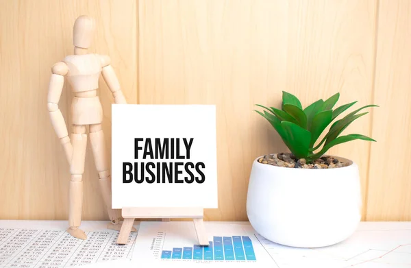 Tekst Family Business Ezel Met Kantoorgereedschap Papier Top View — Stockfoto