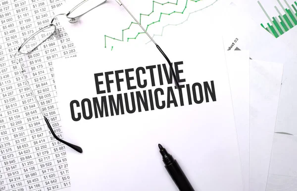 effective communication . Conceptual background with chart ,papers, pen and glasses