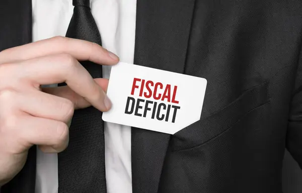 Businessman Holding Card Text Fiscal Deficit — Photo