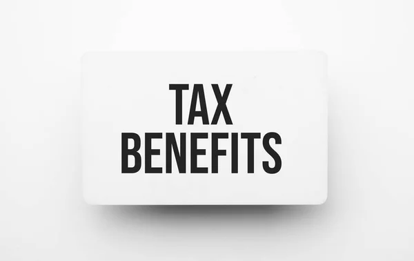 Tax Benefits Sign Notepad White Backgound — Stock Photo, Image