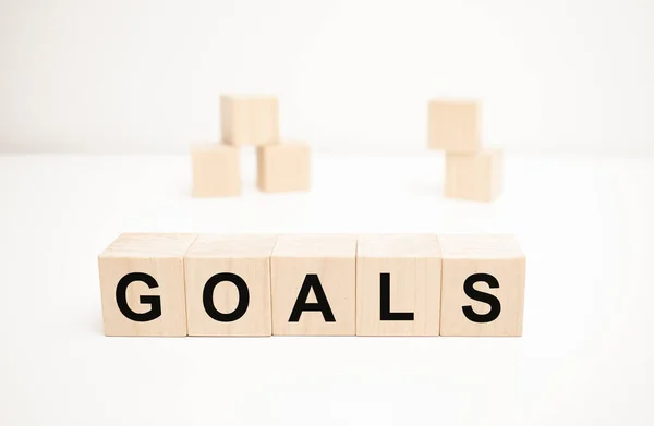 Word Goals Written Wooden Cubes Structure Blocks Bright White Background — Stock Photo, Image