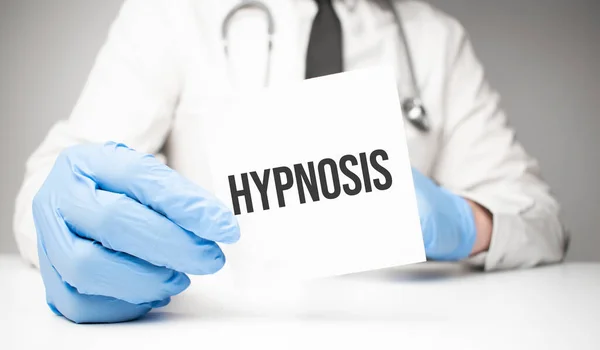 White Sticker Text Hypnosis Doctor Hands Stethoscope Stock Photo