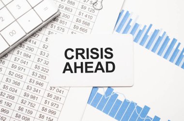 Metin CRISIS AHEAD ile hesap makinesi, rapor ve kart