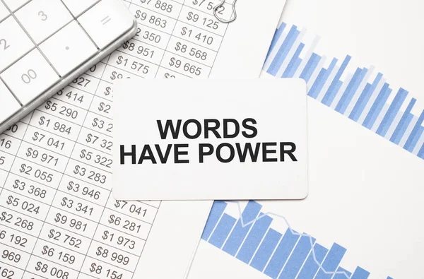 calculator,reports and card with text Words Have Power