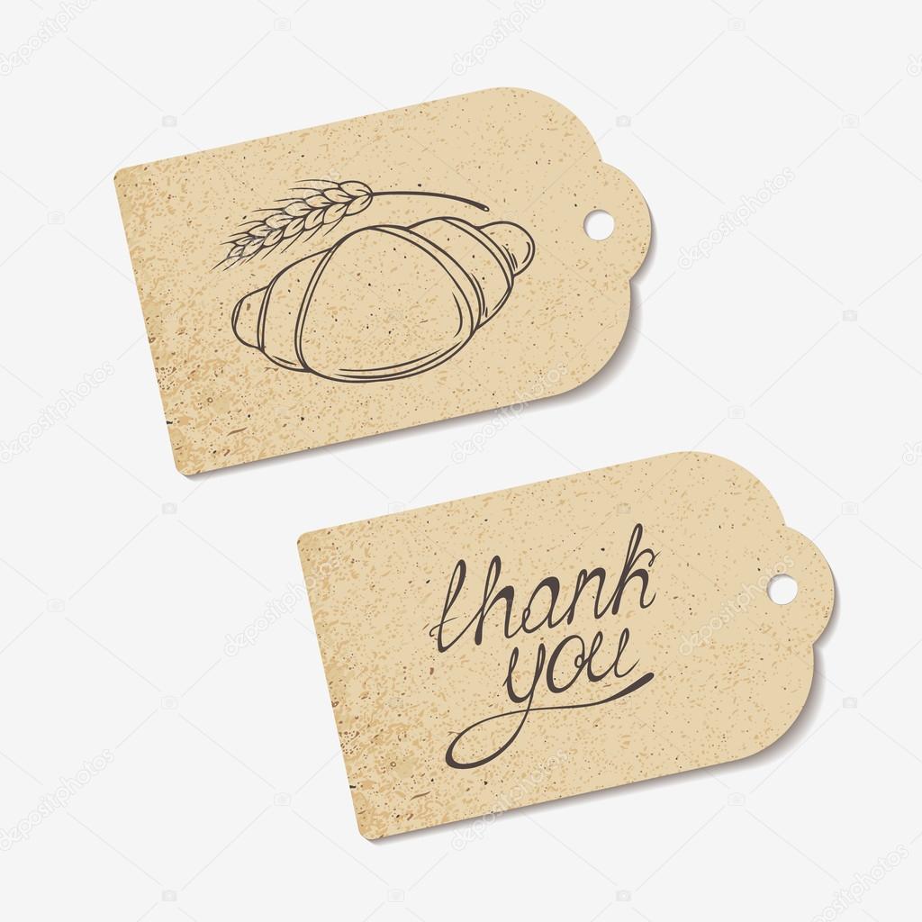 Craft paper tags with THANK YOU hand lettering and sketched croissant