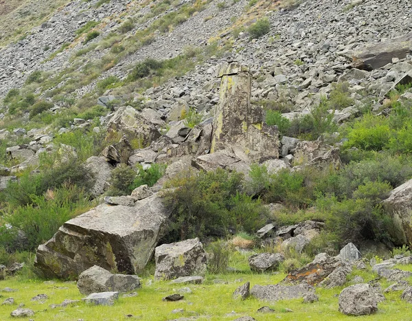 Stone pillars on a scree background, texture. — Stock Photo, Image