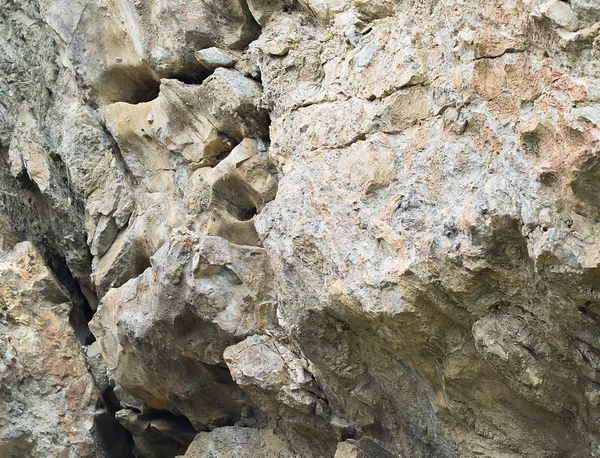La superficie de la roca con líneas de intercambio, diferentes colores — Foto de Stock