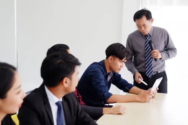 Senior Asian Leader Teaching Business Marketing Business People Having Seminar Royalty Free Stock Images