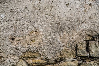 Tuğla duvardaki eski sıva dokusu..