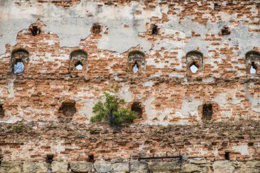 Tuğla duvardaki eski sıva dokusu..