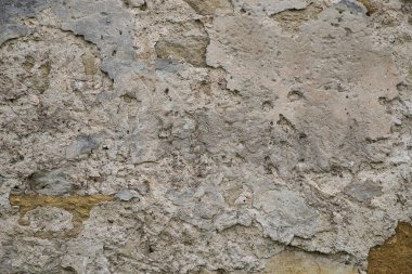 Tuğla duvardaki eski sıva dokusu..