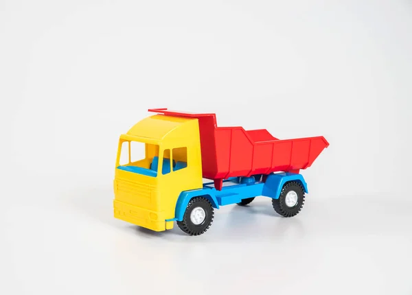 Plastic Kinderwagen Geïsoleerd Witte Achtergrond Veelkleurige Vrachtwagen — Stockfoto